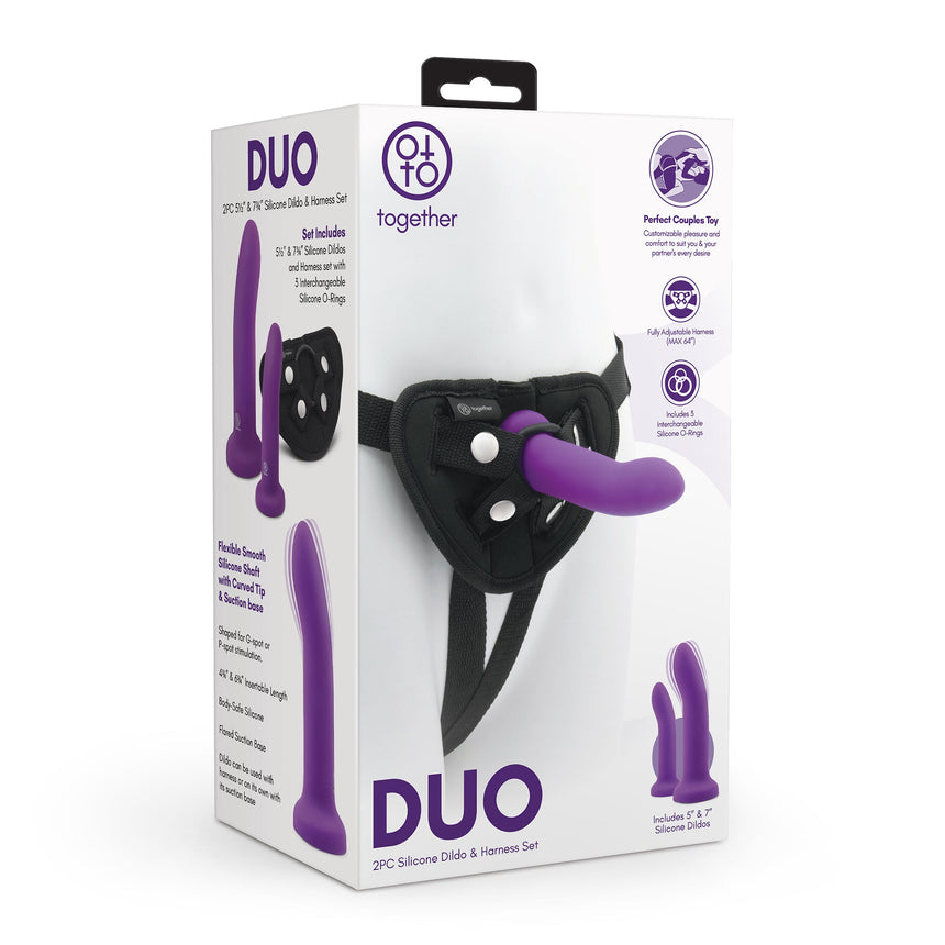 Box of DUO silicone dildos and harness set on a white background