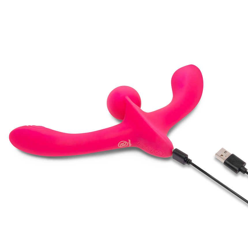 Pink silicone double ended vibrator with USB cable on a white background
