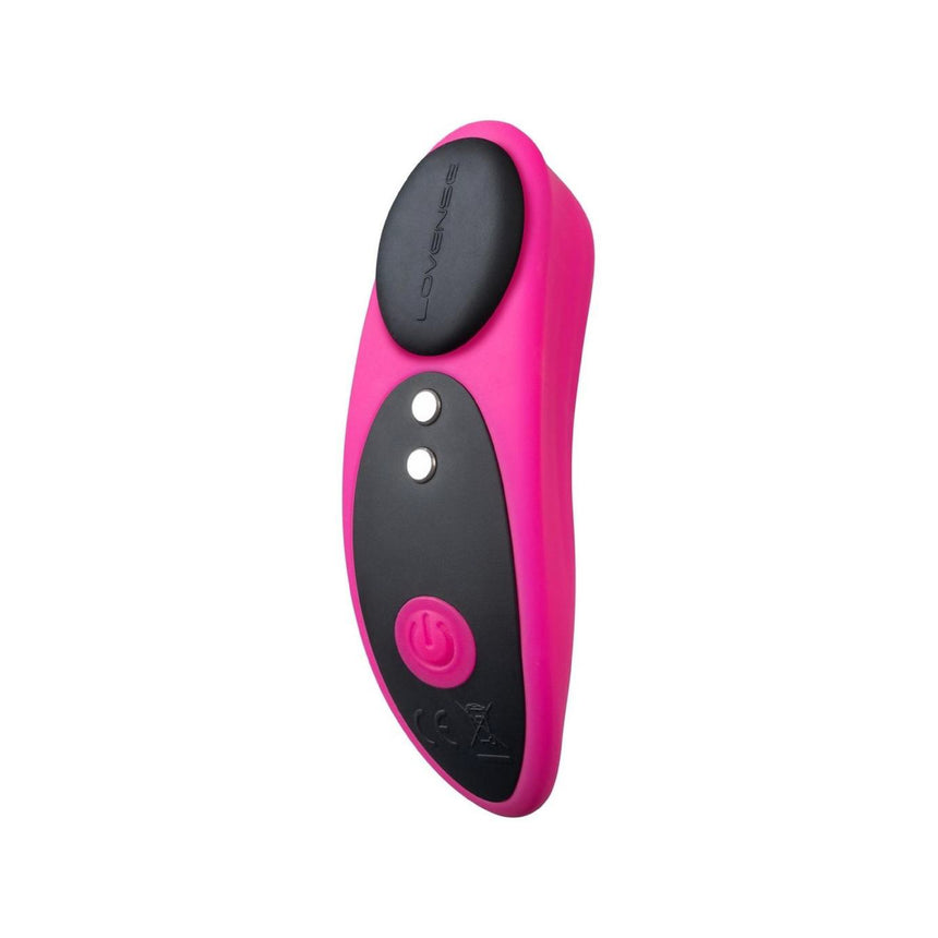 Pink Lovense Ferri rechargeable silicone panty vibrator shown standing at an upright angle with control buttons visible.