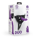 Box of DUO silicone dildos and harness set on a white background