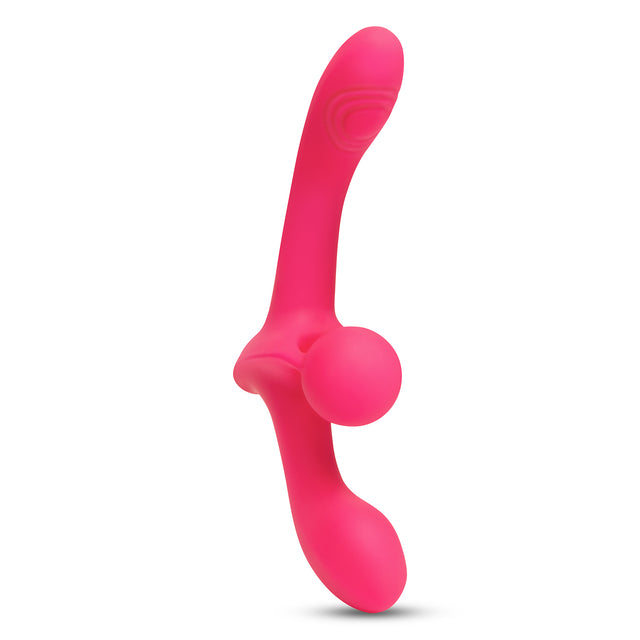Pink silicone Double-Ended Vibrating Strapless Strap-On on a white background