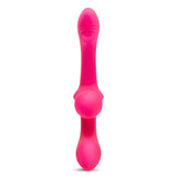 Pink silicone dual ended vibrator on a white background