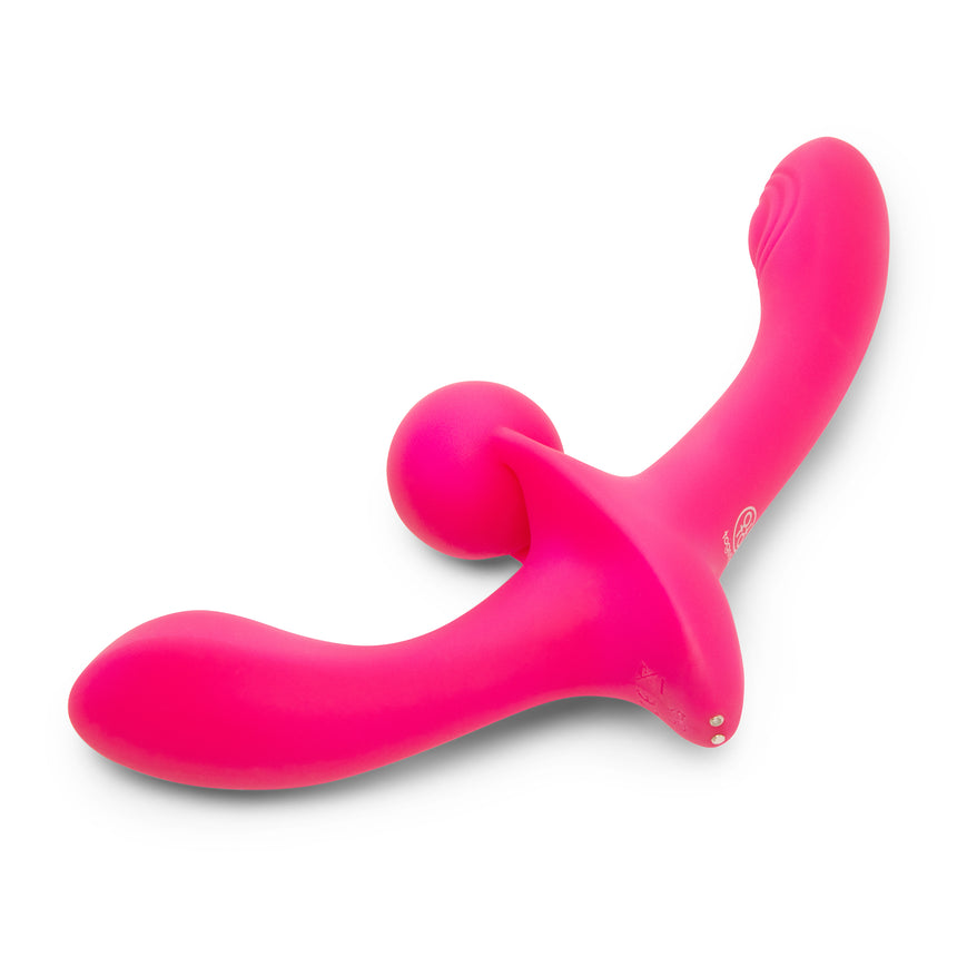Pink toy with a curved design on a white background