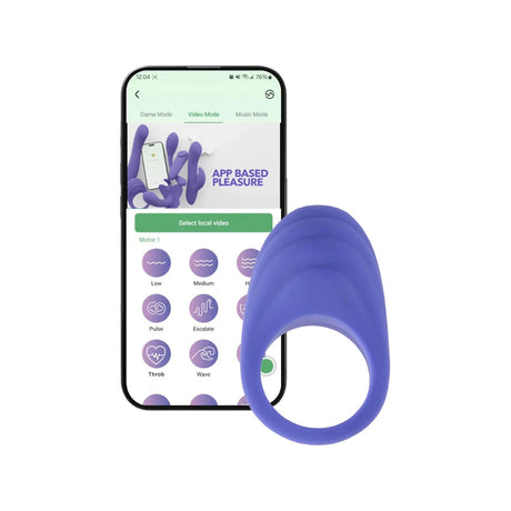 Purple CalExotics Connect couples ring displayed next to a smartphone showing the companion control app interface.
