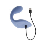 Blue Gender X Shifting Gears silicone vibrator shown with the included USB charging cable.