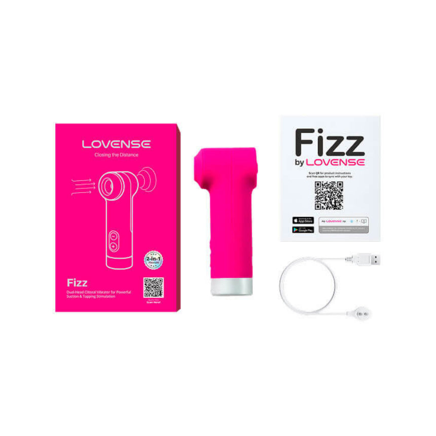 Official pink retail packaging box for the Lovense Fizz Dual-Head Clitoral Vibrator shown with user manual.