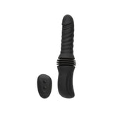 Black CalExotics Overdrive rechargeable silicone sex machine thruster shown standing with its wireless remote control.