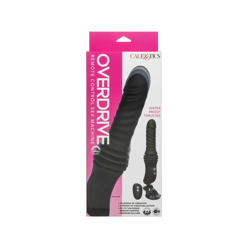 Front angle view of the CalExotics Overdrive sex machine inside its clear window retail box packaging.