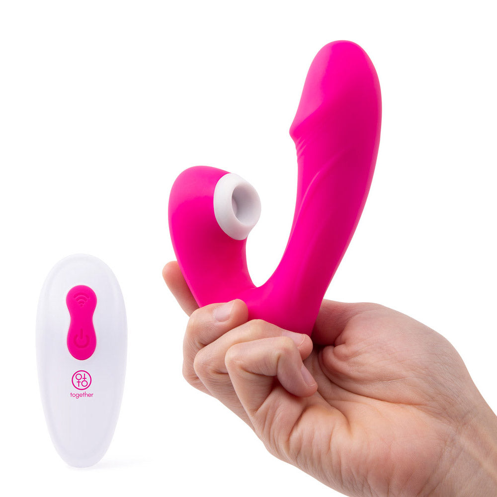 Model holding the Together Vibes Internal Kisses Remote Controlled Vibrator 