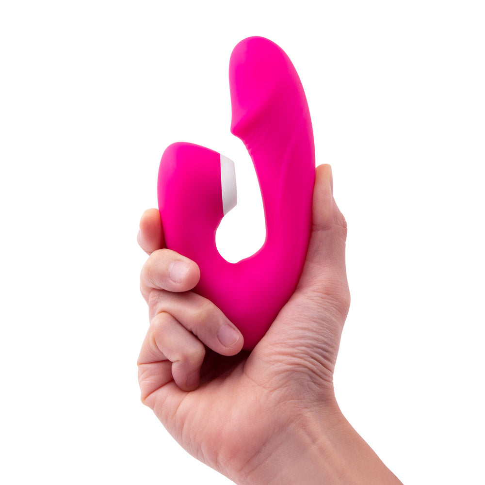 Model demonstrating the bendiness by squeezing the Together Vibes Internal Kisses Remote Controlled Vibrator